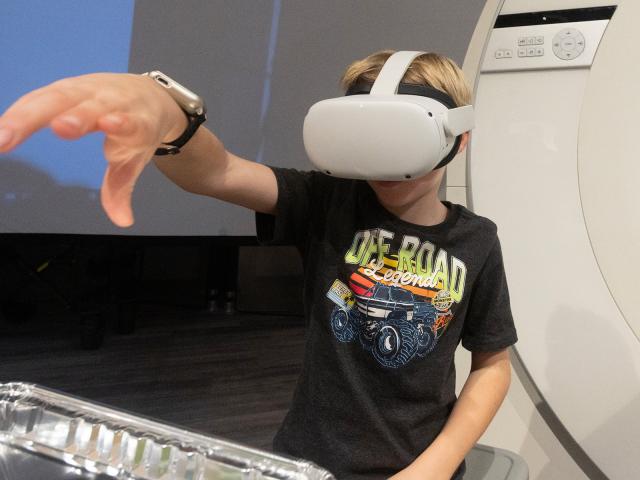 Child using virtual reality as a learning tool