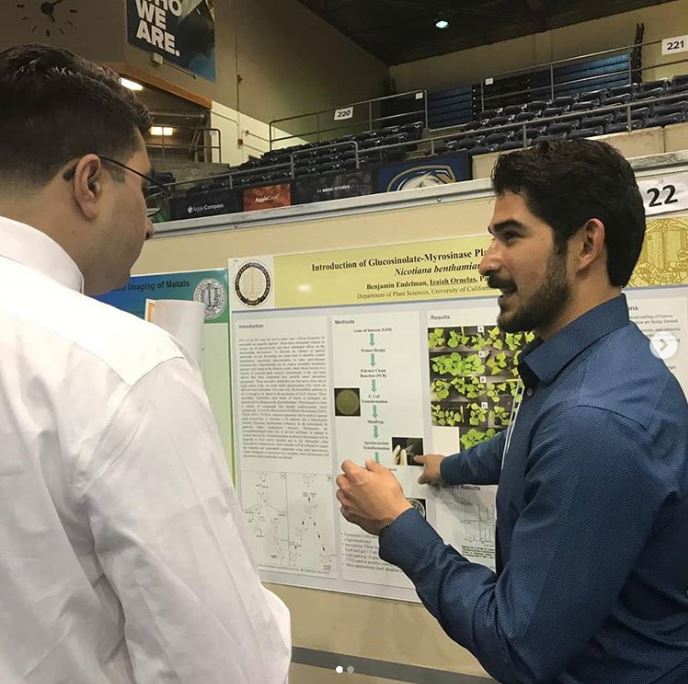 Izaiah presenting at conference