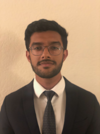 Profile photo of Rishi Sharma in suit and tie